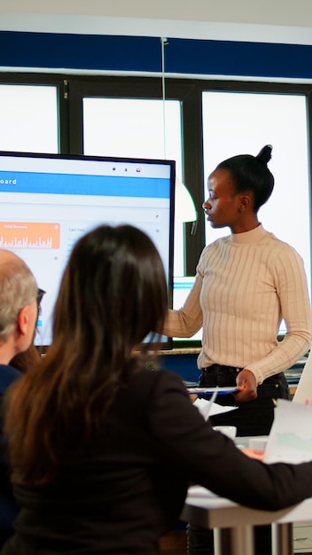 A map laid on a table with a compass and a notepad — suggesting purposeful planning and direction